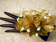 White and gold corsage
