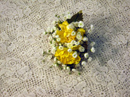 Yellow and white mini carnations boutonniere