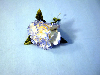 Light blue boutonniere from Kircher's Flowers in Defiance and Paulding, OH