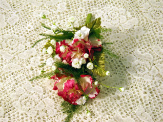 Burgandy boutonniere from Kircher's Flowers in Defiance and Paulding, OH