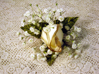 White and gold boutonniere from Kircher's Flowers in Defiance and Paulding, OH