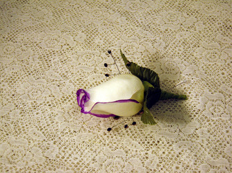 White and purple boutonniere from Kircher's Flowers in Defiance and Paulding, OH