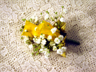 Yellow butonniere from Kircher's Flowers in Defiance and Paulding, OH